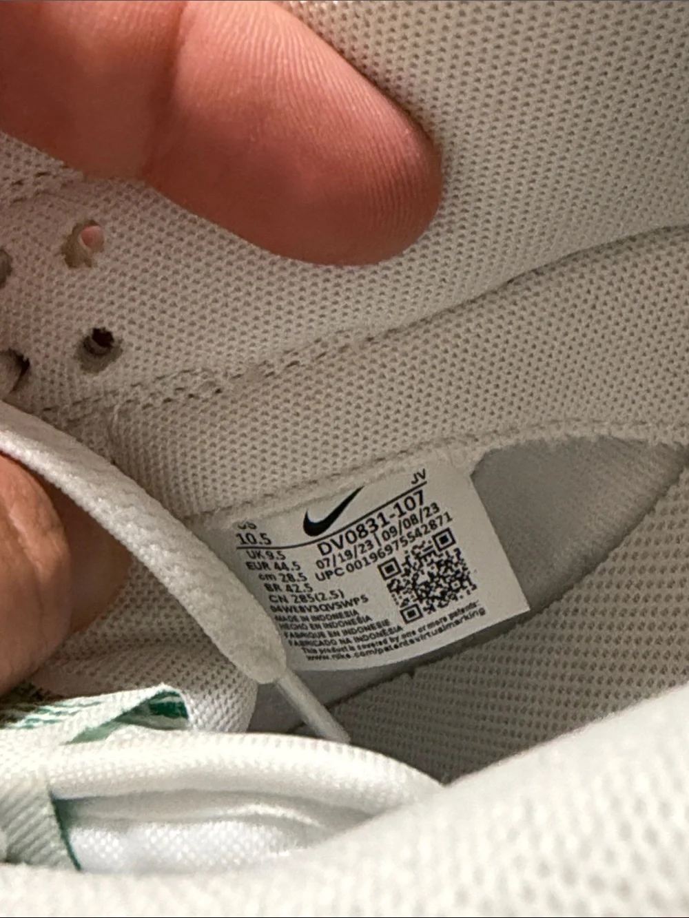 Nike White Low-Top Sneakers with Green Swoosh